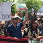 Everyone is loving Leo DiCaprio's tiny handwritten sign at a climate change protest