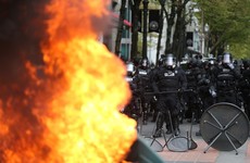 Protesters hurl cans of Pepsi at police during US May Day riots