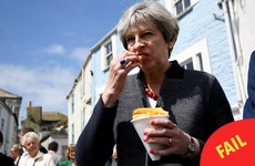 These photos of Theresa May awkwardly eating chips have become a huge meme