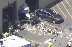 Multiple injuries reported after SUV drives into crowd at US car auction