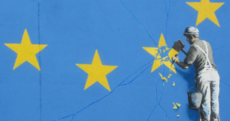 Banksy's new mural shows a man chipping away at the stars in the European flag