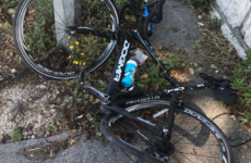 Chris Froome's bike 'totalled' after car follows him onto pavement