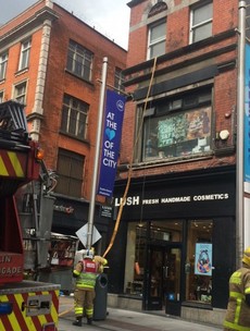 Firefighters respond to fire above Lush on Henry Street