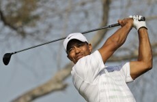 Woods leads in Abu Dhabi, as Irish contingent remain in contention