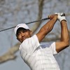 Woods leads in Abu Dhabi, as Irish contingent remain in contention