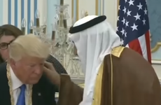 Donald Trump bows to Saudi king and signs $110 billion arms deal with the Gulf state