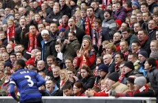 Police to investigate footage following fan's alleged racist gesture - report