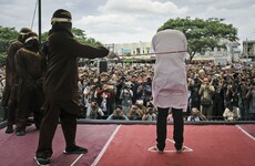 Two Indonesian men caned in front of jeering crowd for having sex