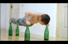 World's 'strongest child' does push-ups on glass bottles