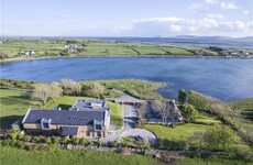 This modern coastal hideaway has its own thatched cottage and views of the Burren