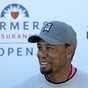 Tiger Woods sorry after arrest, says alcohol not involved