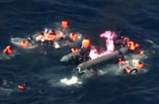 Dramatic video shows migrants rescued from burning boat off coast of Spain