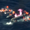 Dramatic video shows migrants rescued from burning boat off coast of Spain