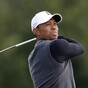 Woods found asleep at the wheel but passed roadside breath test