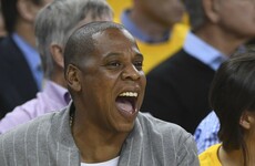 Jay Z has been caught rapid awkwardly fake laughing for photos