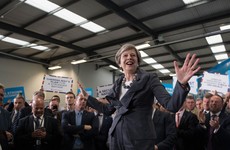 May says she will change human rights laws to fight terrorism
