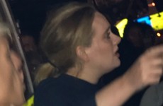 There were emotional scenes as Adele visited the scene of the London tower block fire last night