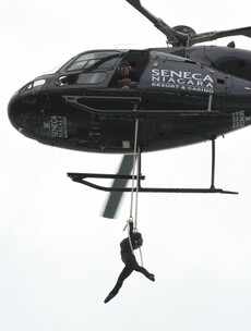 Daredevil woman hangs from helicopter above Niagara Falls... by her teeth