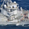 Seven US sailors missing after destroyer rammed by cargo ship