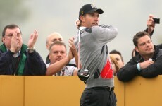 Harrington roars into contention in Malaysia