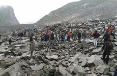 Over 140 people feared buried after landslide swallows Chinese village