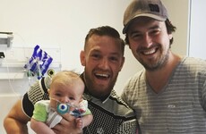 These photos of Conor McGregor visiting kids in Crumlin Children's Hospital are class