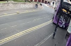 CCTV footage shows man hit by bus in England escape without serious injuries