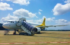 Airline apologises after wheelchair user forced to crawl up steps to board plane