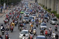 These iconic sights could be ending as Vietnam's capital vows to ban motorbikes