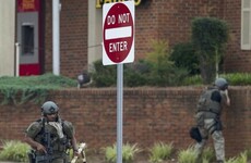 US man who barricaded himself in bank and claimed to have a bomb dies after police stand-off