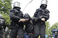 Protesters and police clash violently on first day of G20 summit