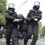 Protesters and police clash violently on first day of G20 summit