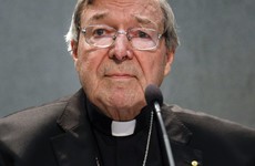 Cardinal Pell returns to Australia to face abuse charges