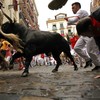 Pamplona police chase down Italians fleeing a restaurant bill after the bull run