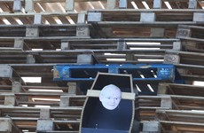 Coffin with effigy of Martin McGuinness on loyalist bonfire in east Belfast
