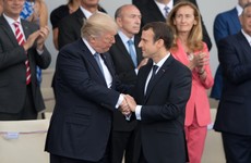 A 25-second handshake, military parades and Daft Punk: Donald Trump enjoyed Bastille Day today