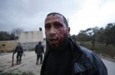 Over a dozen dead as shelling of Syrian city of Homs continues