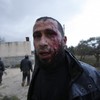 Over a dozen dead as shelling of Syrian city of Homs continues