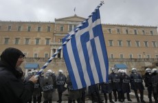 Greece leaders reach deal on more austerity and cuts