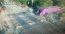 Train services delayed after bin truck damages crossing barrier