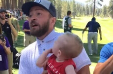 Justin Timberlake recreated *that* Lion King moment when someone handed him their baby