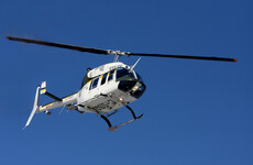 Four cleared of using UK police chopper to film nude sunbathers