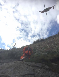 Coast Guard rescues woman who became trapped trying to recover drone on cliff edge