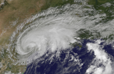 At least two dead as city streets turn into rivers and dozens of tornados strike Texas