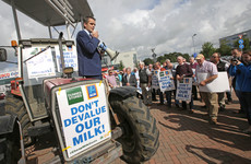 Farmers gather outside supermarkets in protest at low milk prices