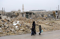 Syria says an Israeli air raid on a military position killed two soldiers