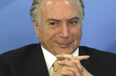 Brazil's president charged with obstruction of justice and leading a criminal group