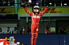 Vettel snatches Singapore pole with stunning lap record
