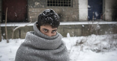 'Fourteen kilometres separate life from death': Award-winning photographer captures the trials of refugee life