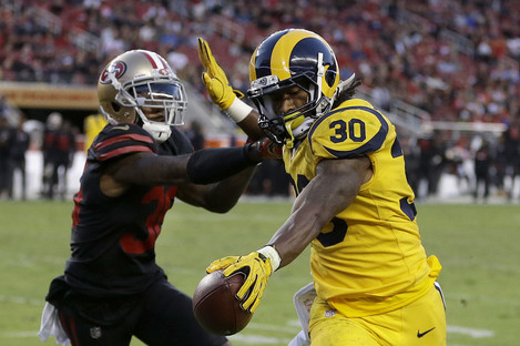 Rams running back Todd Gurley scores one of his two touchdowns.